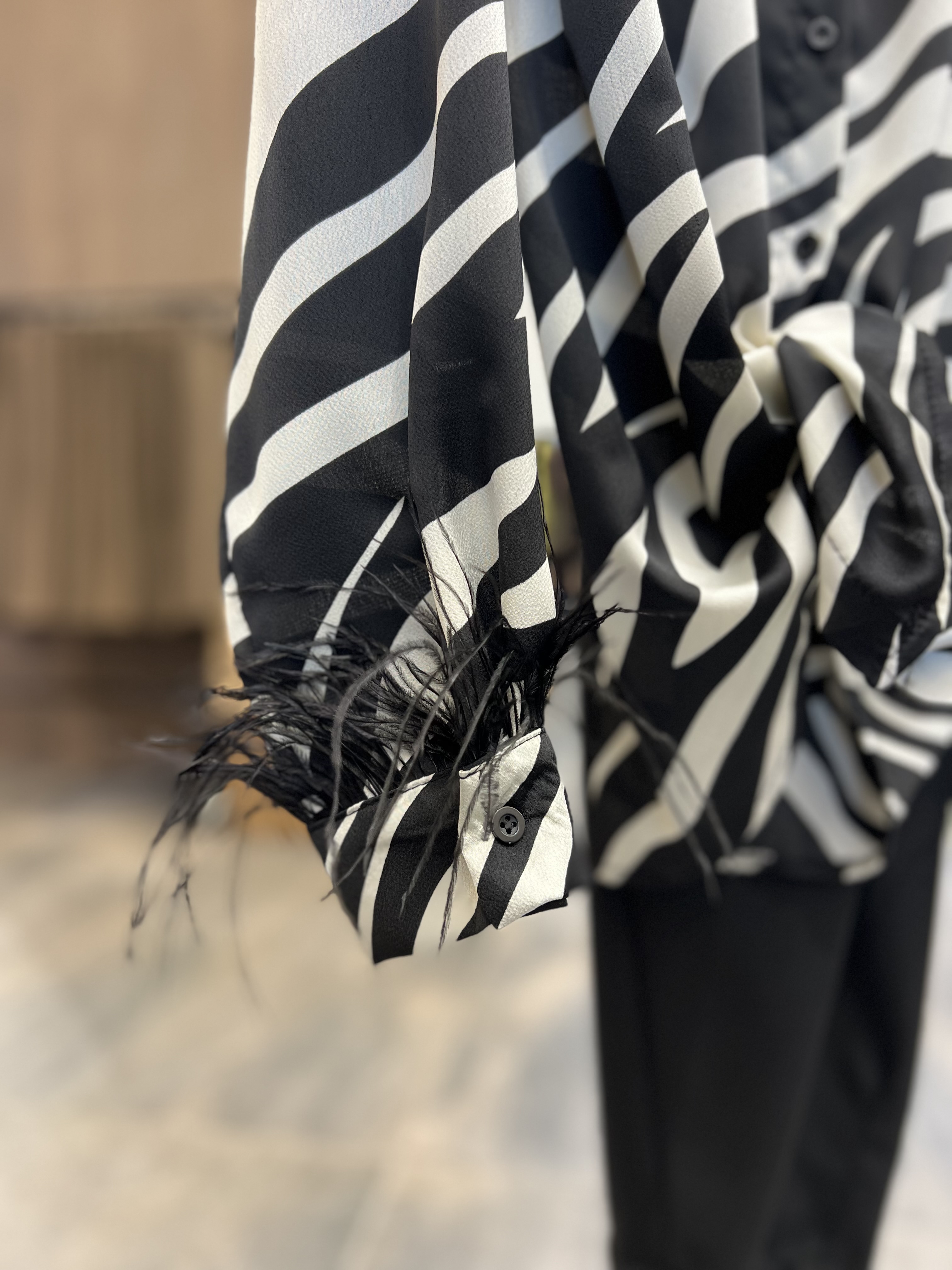 Camicia con piume