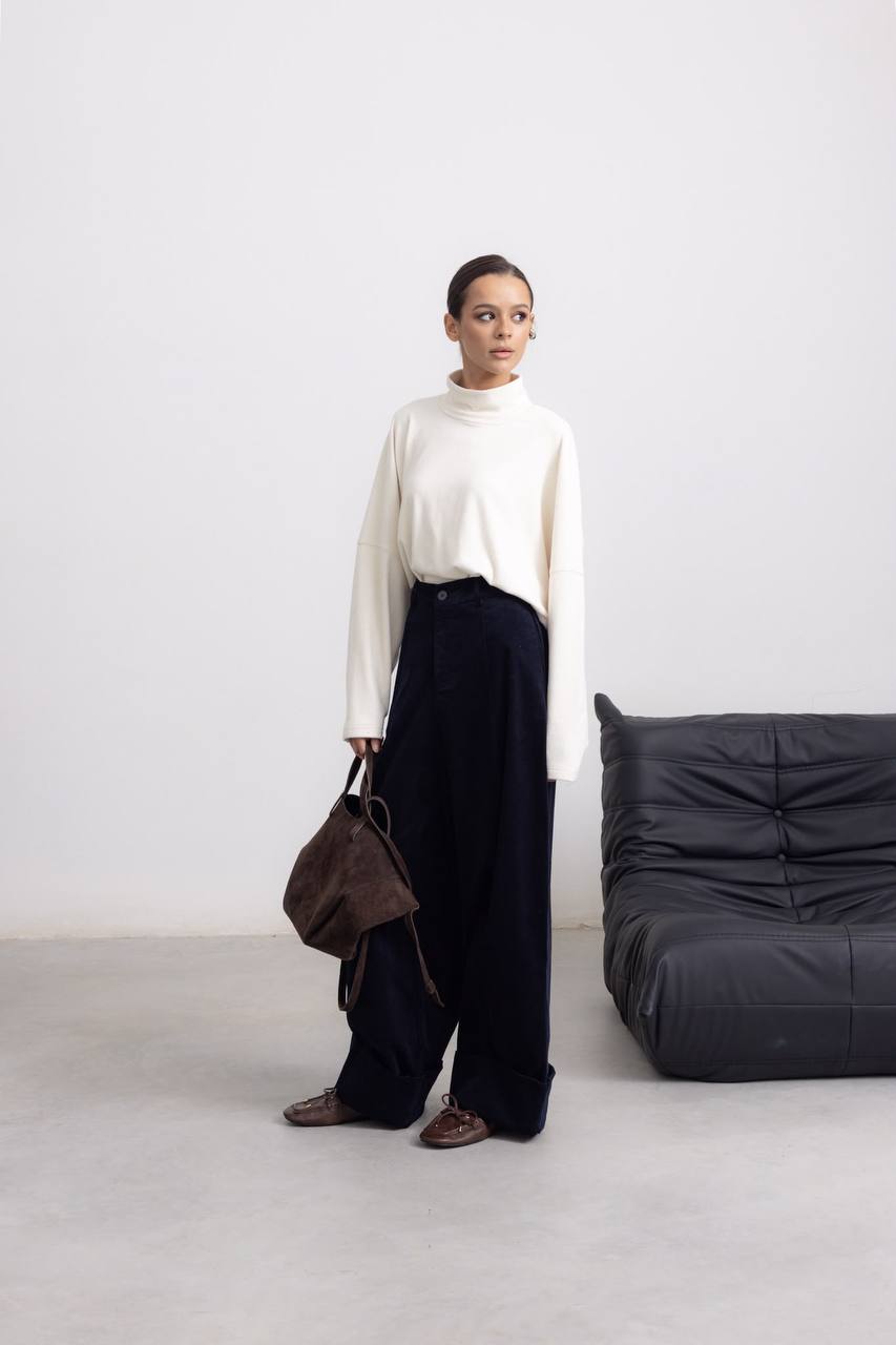 Pantaloni palazzo con risvolto