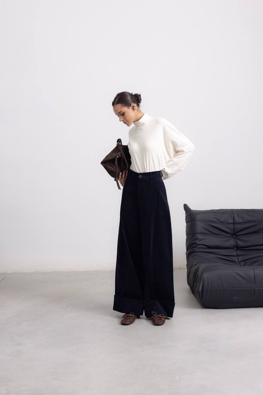 Pantaloni palazzo con risvolto